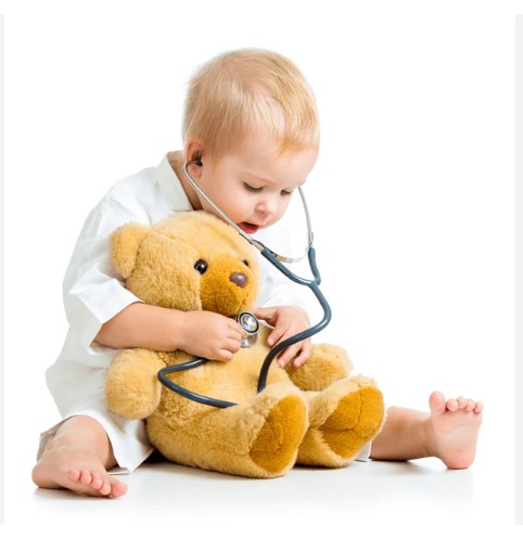 Kid doctor reviewing patient information